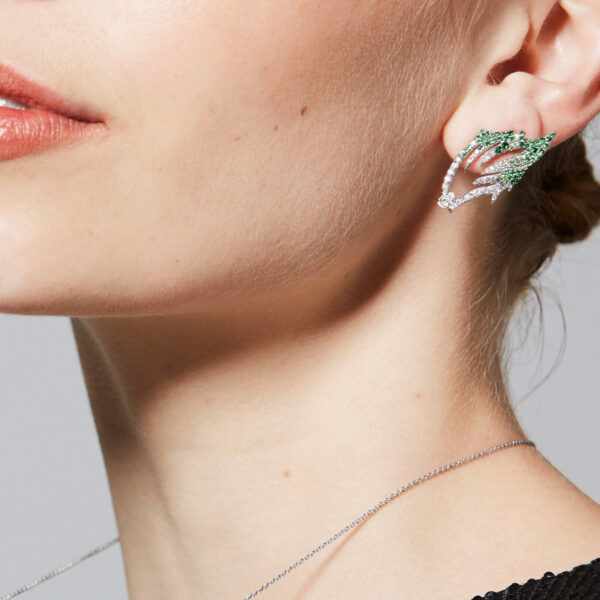 Diamond Couture high jewellery tsavorite cuff earring with model